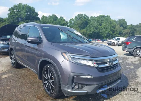 2020 Honda Pilot Awd Touring 7 Passenger z USA, uszkodzony, nr VIN 5FNYF6H67LB006686